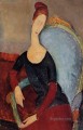 青い椅子に座るジャンヌ・エビュテルヌの肖像画 1918年 アメデオ・モディリアーニ